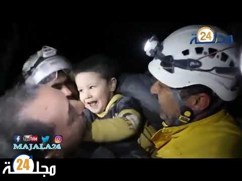 بالفيديو..لحظة إنقاذ طفل تحت أنقاض مبنى مكون من 5 طوابق و بعد 50 ساعة من الانتظار.
