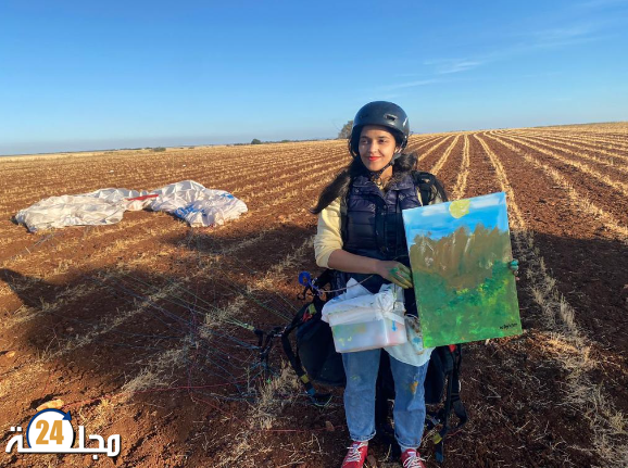 الفنانة التشكيلية المغربية هدى بنجلون أول فنانة حلقت على ارتفاع 900 متر وأبدعت في رسم لوحة جميلة