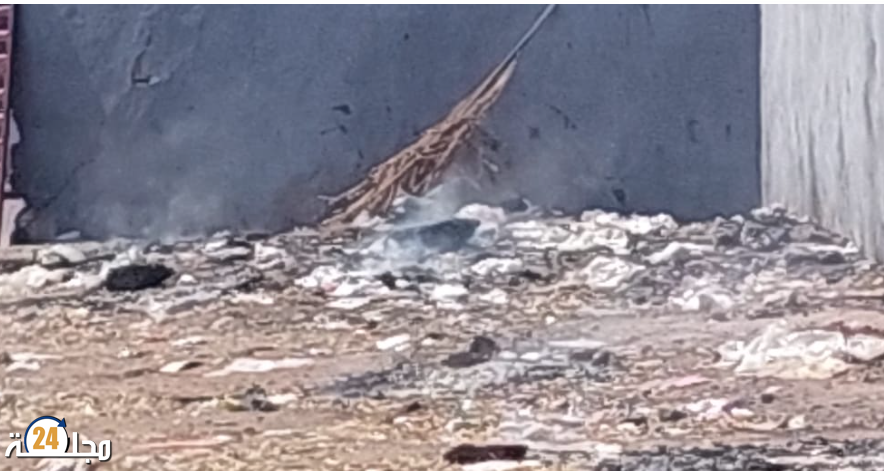 مدينة البئر الجديد .. حرق عشوائي للنفايات يخنق الساكنة
