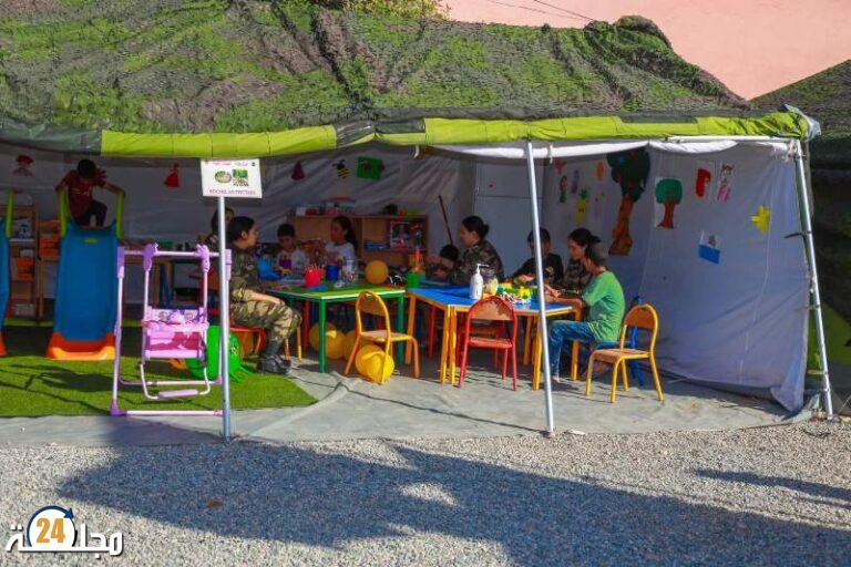 زلزال الحوز.. المساعدات الاجتماعيات للقوات المسلحة الملكية يرسمن البسمة على وجوه الأطفال