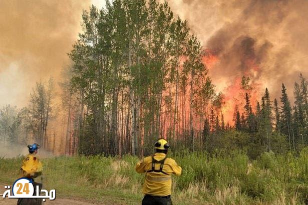 كندا.. إجلاء نزلاء سجن بعد انتشار حرائق الغابات شرق البلاد